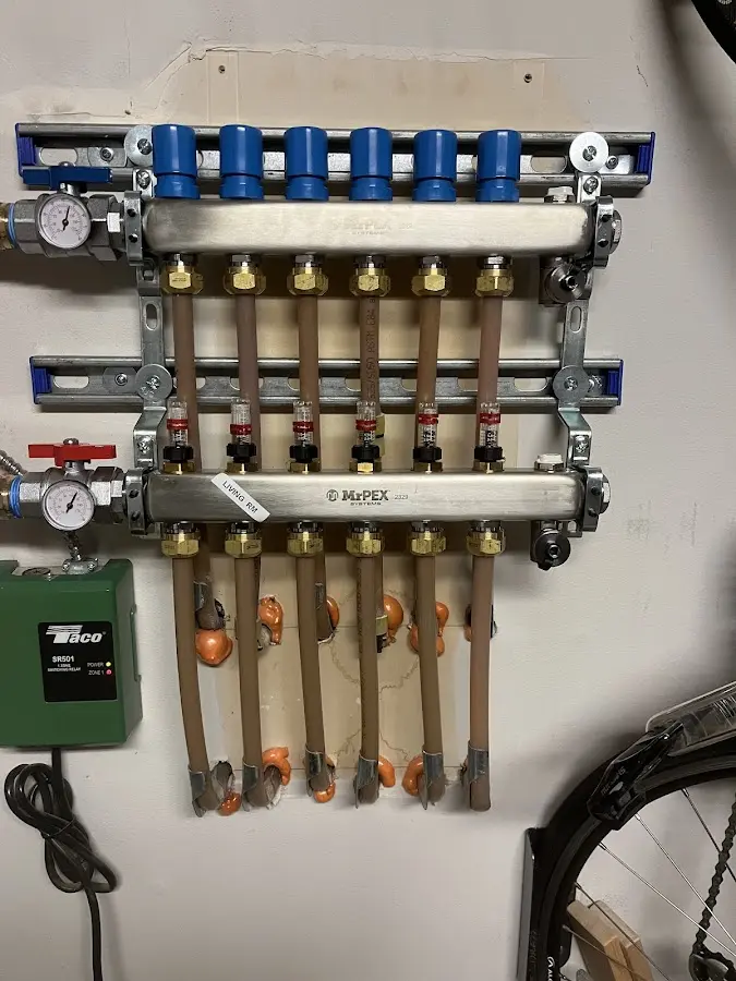 Plumber performing Water Heater Repair at a residential property in Key Biscayne